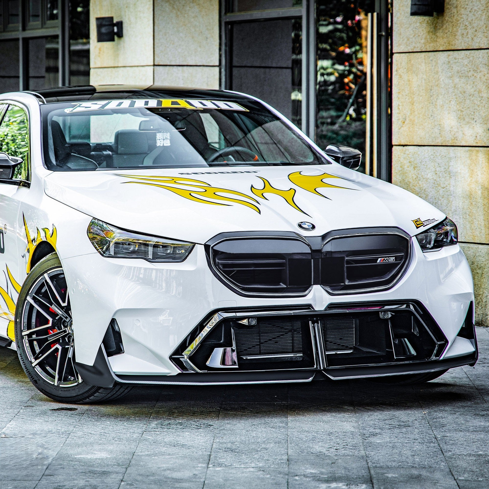 Pre-Preg Carbon fiber front splitter for BMW G90 G99 M5 2025-present, showcasing its sleek aerodynamic design.