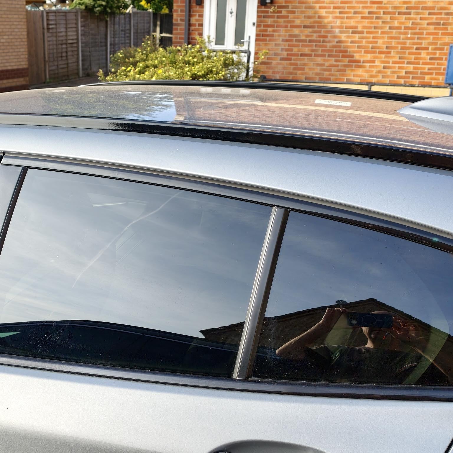 Gloss black exterior luggage rack trims for BMW F40 1 Series 2019-2024, sleek black finish, designed for enhanced vehicle appearance.