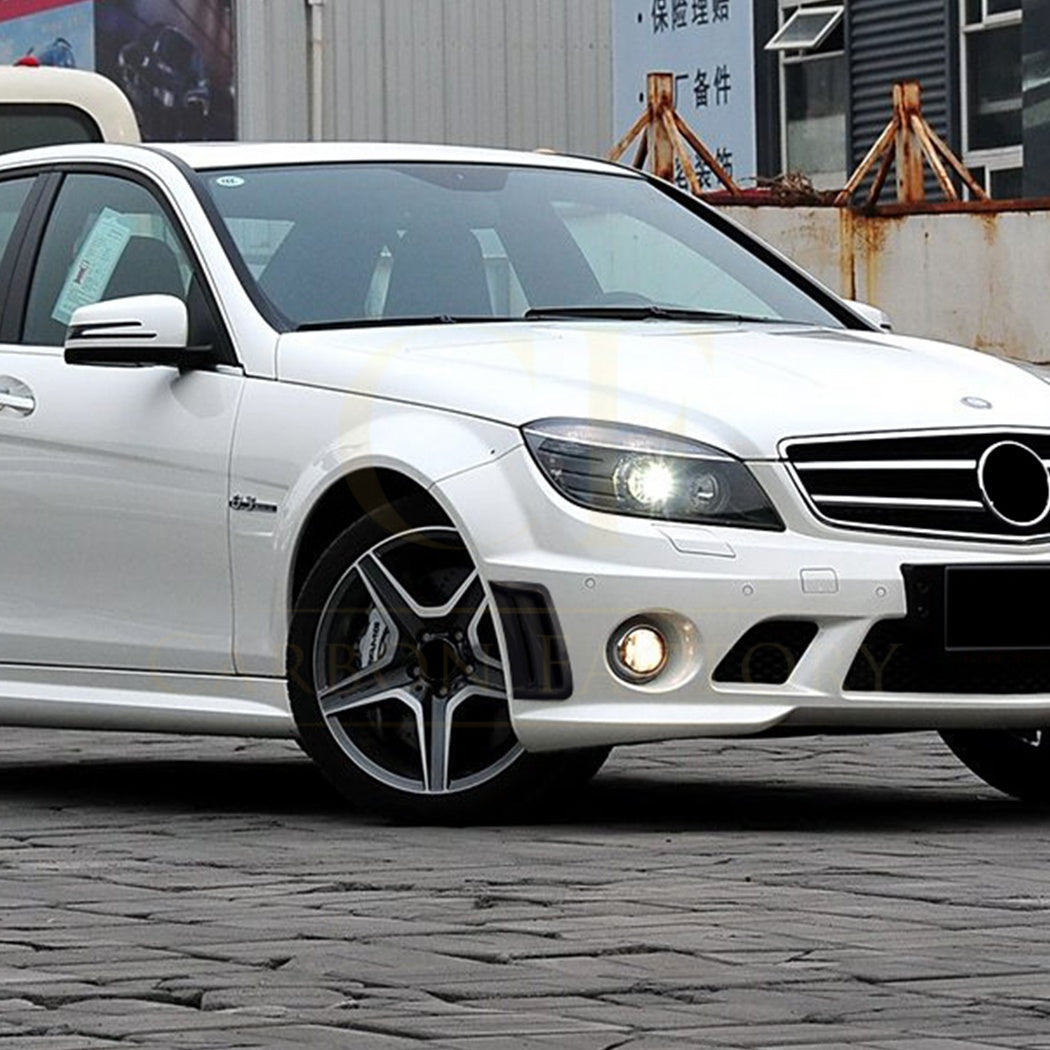 Gloss black side vents for Mercedes Benz W204 C Class AMG exterior trims, shown on the vehicle's side profile.