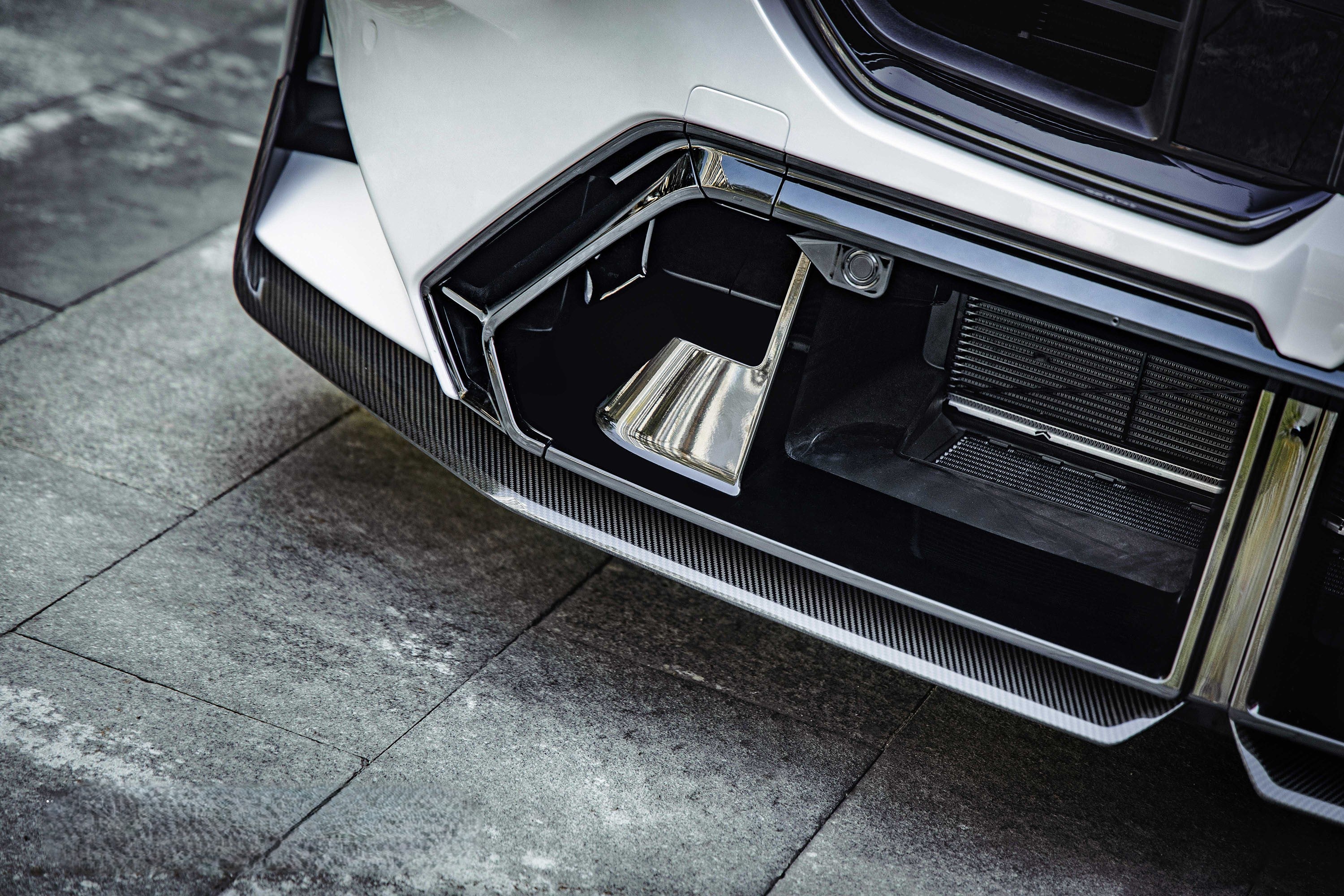 Pre-Preg Carbon fiber front splitter for BMW G90 G99 M5 2025-present, showcasing sleek, aerodynamic design.
