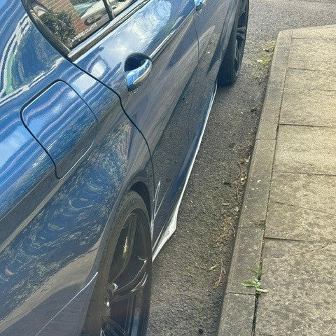 Carbon Fibre universal side skirt for cars, sleek and lightweight with a textured carbon fiber finish, designed to enhance vehicle aerodynamics.