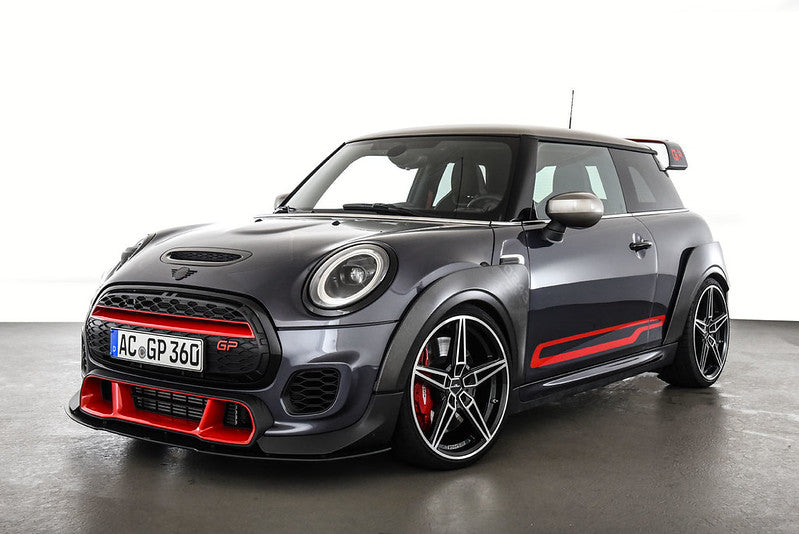 AC Schnitzer front splitter for MINI F56 GP, aerodynamic carbon fiber component with mounting points, enhances sporty front appearance.