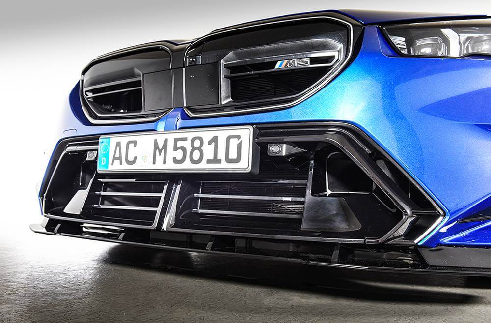 AC Schnitzer front grill for BMW M5 G90/G99, aerodynamic design, black finish, with mounting details visible in the image.