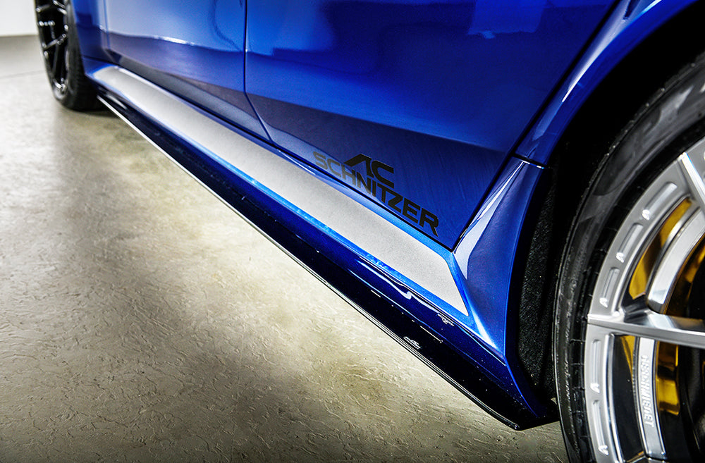 AC Schnitzer side skirt protection foil for BMW M5 G90/G99, aerodynamic foil with branded logo on the side skirt.
