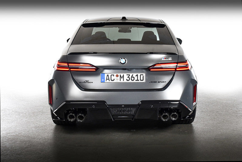 AC Schnitzer rear skirt protection foil for BMW M5 G90, aerodynamic foil installed on the rear bumper for enhanced protection and style.