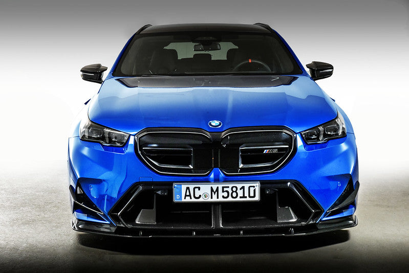 AC Schnitzer front grill for BMW M5 G90/G99, aerodynamic design, black finish, with detailed mesh pattern and branding accents.