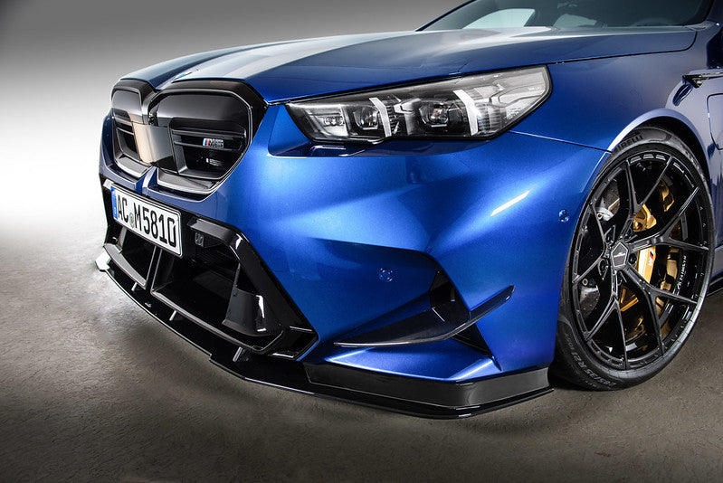 AC Schnitzer front side wings for BMW M5 G90/G99 with aerodynamic design, shown in the image.