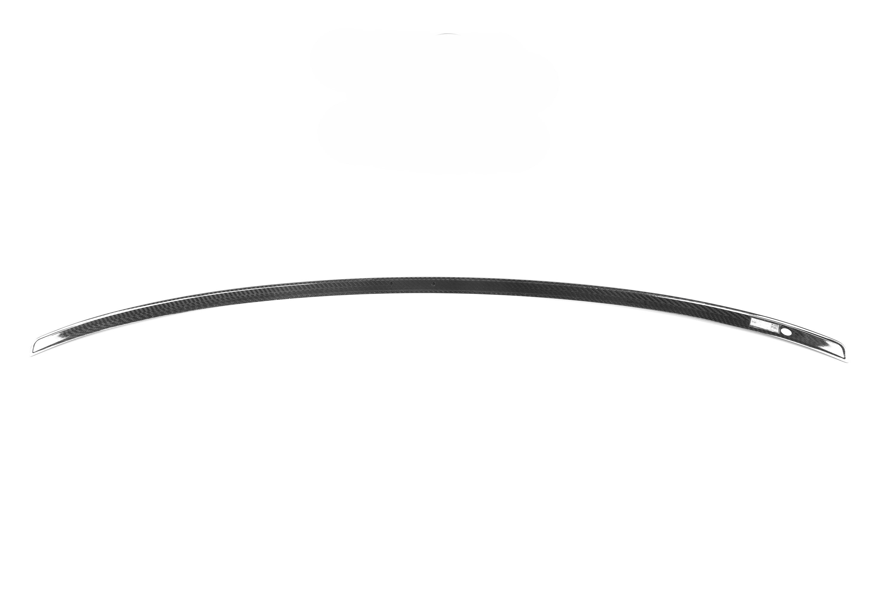 Curved black metal rod on a white background