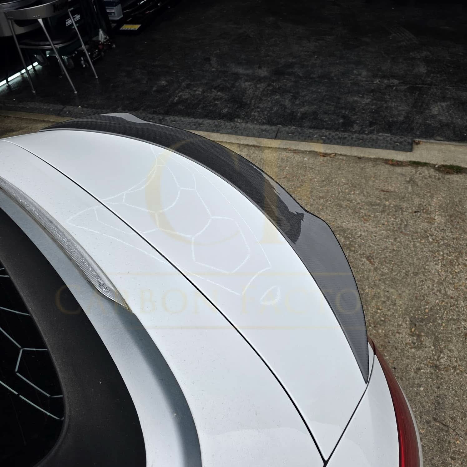 Carbon fibre boot spoiler for Mercedes Benz A205 C-Class Convertible 2015-2021, enhancing sporty appearance and aerodynamics.