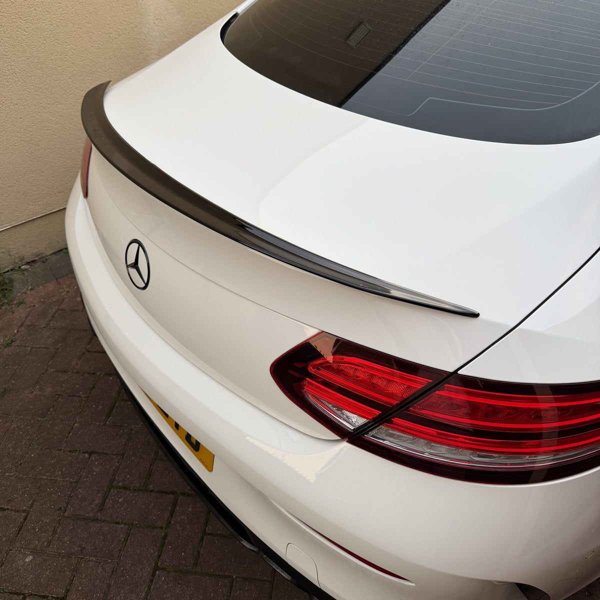 Gloss Black boot spoiler for Mercedes Benz W205 C-Class (2015-2021), enhancing sporty look with sleek style.