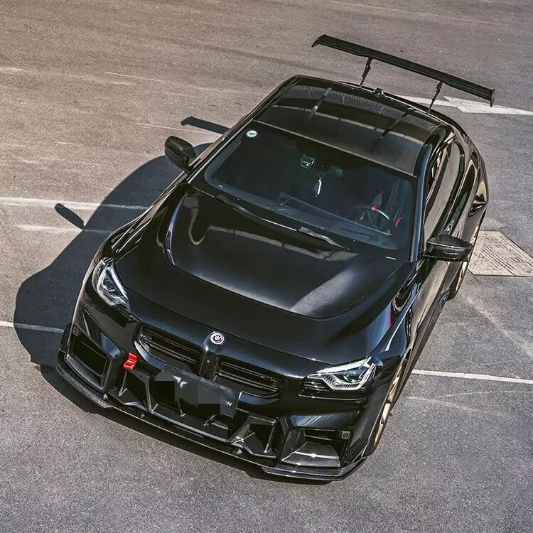 Pre-Preg Carbon fiber bonnet for BMW G87 M2 G42 Coupe, showcasing sleek, lightweight design and smooth finish.
