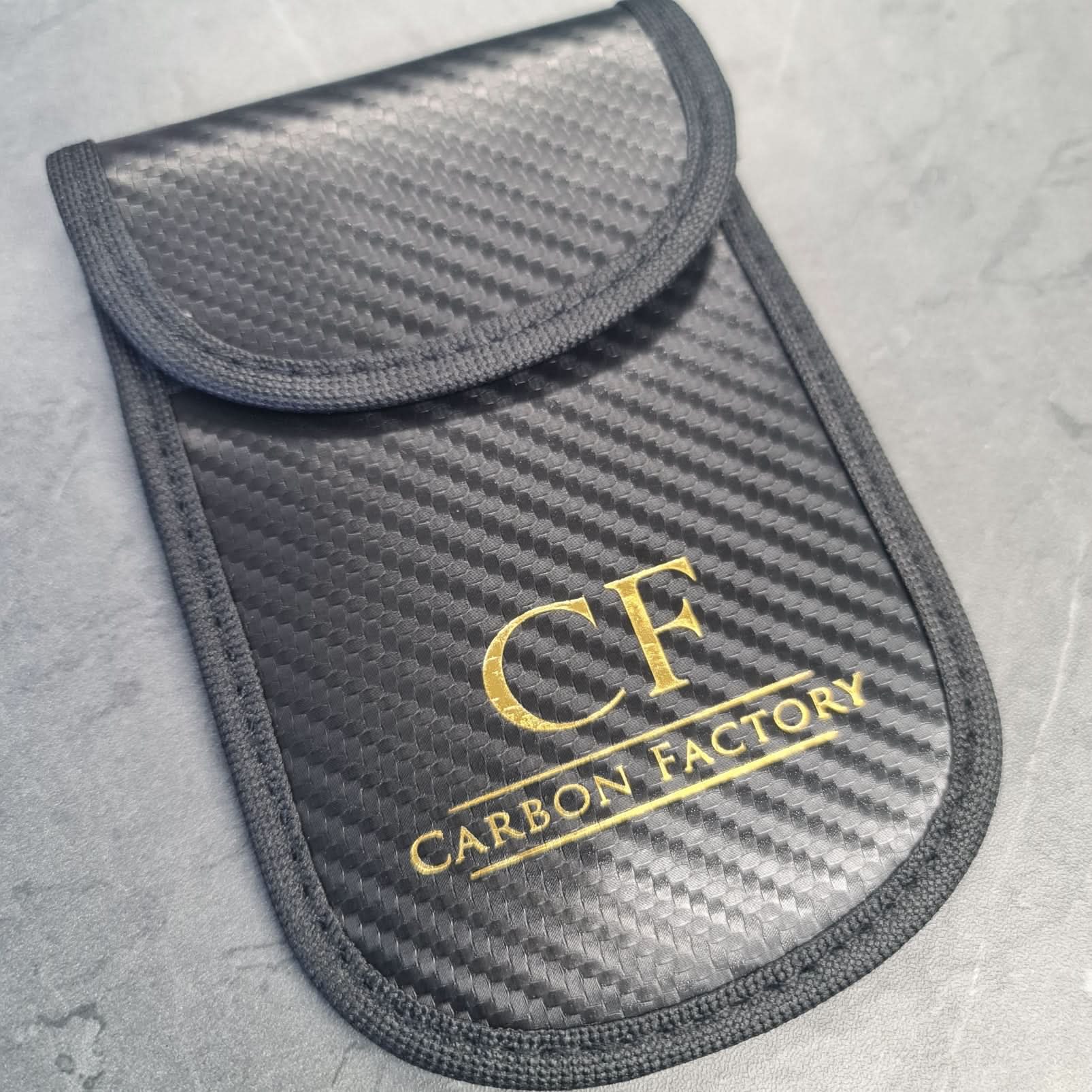 Carbon Factory car key signal blocker pouch, compact accessory to prevent keyless entry signal theft.