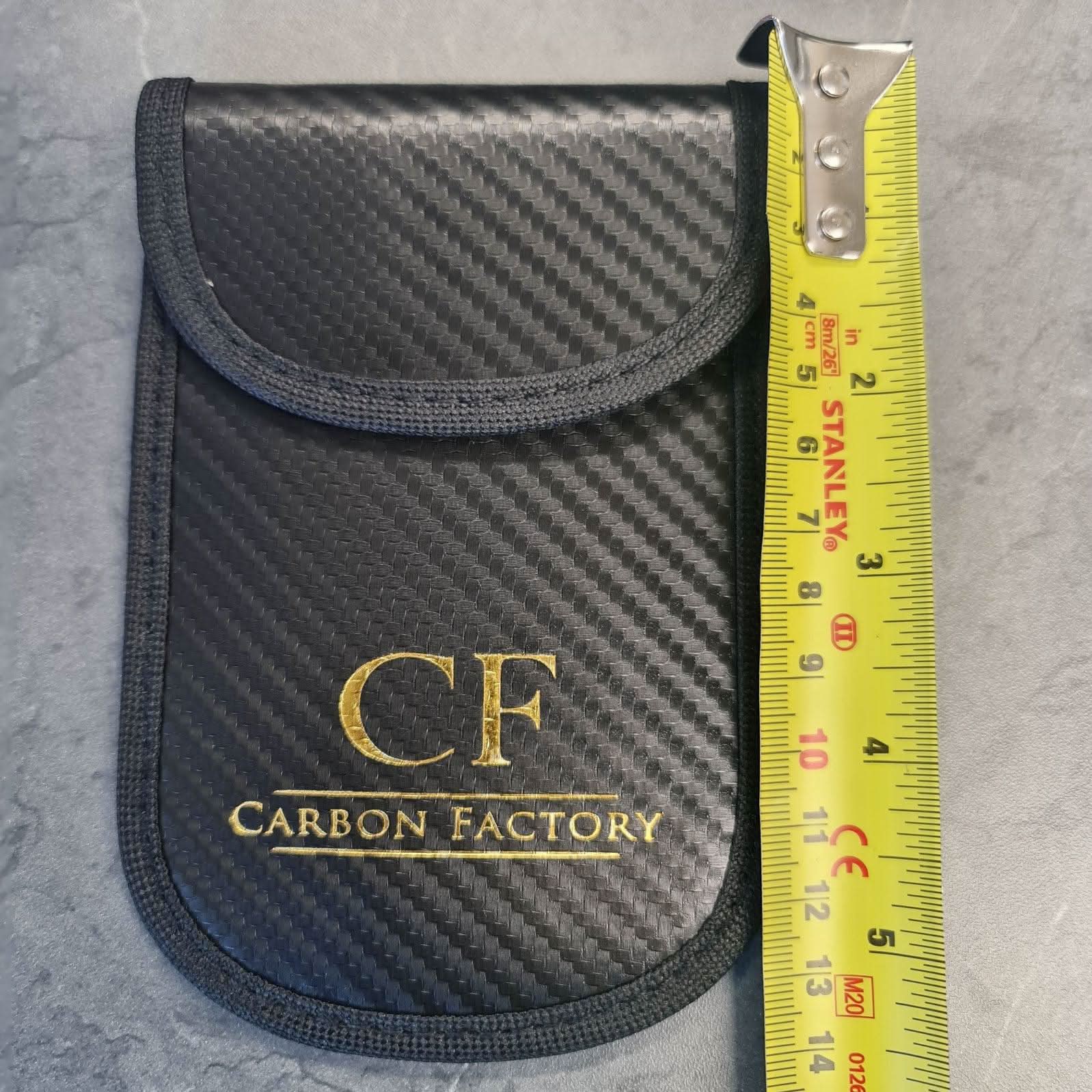 Carbon Factory Car Key Signal Blocker Pouch, a portable accessory with a sleek design for blocking car key signals.