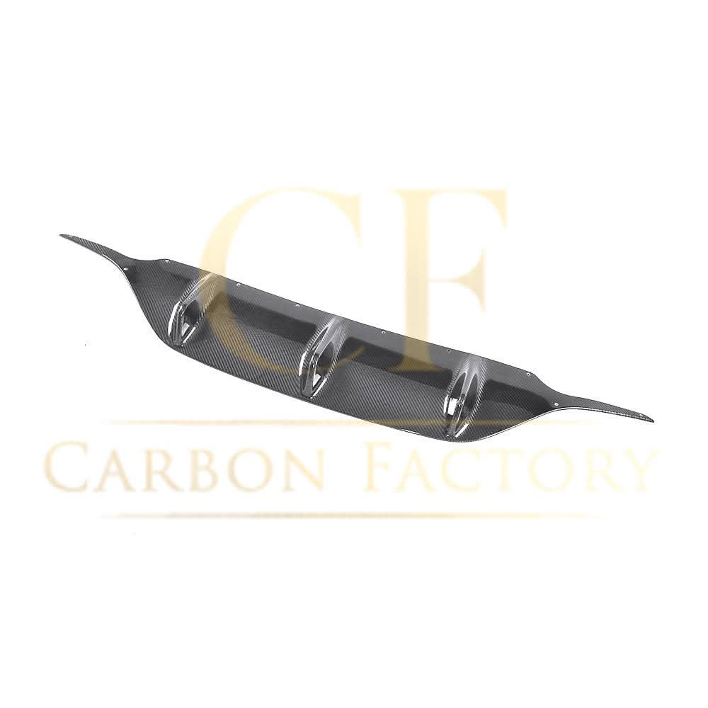 AMG-style carbon fiber rear diffuser for Mercedes C238 E-Class Coupe and Convertible, enhances sporty look and aerodynamics.