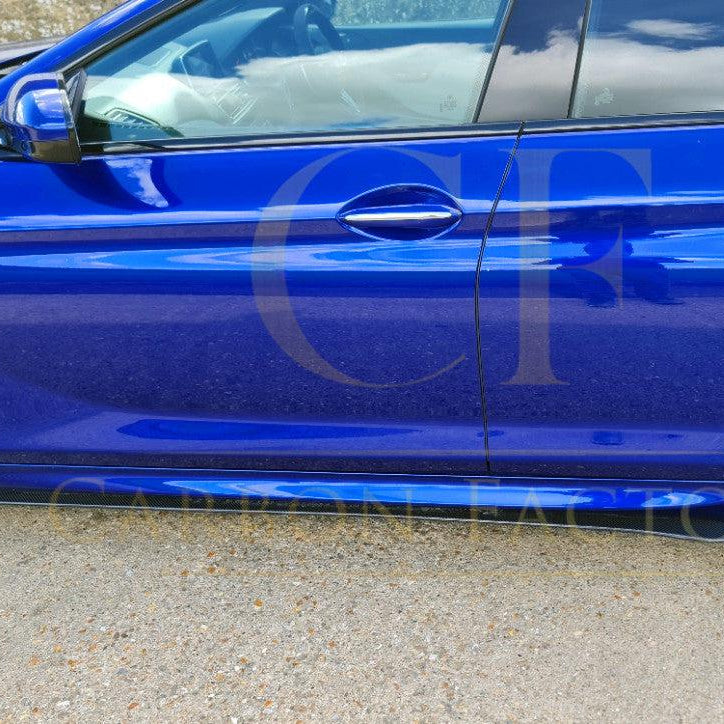 A close-up of a sleek, black carbon fibre side skirt for cars, featuring the A Style universal design for enhanced aerodynamics.