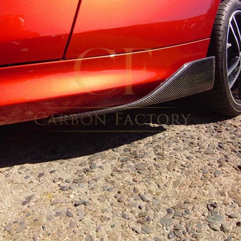 Carbon fibre side skirt for BMW F22 2 Series and F87 M2, stylish and aerodynamic automotive accessory.