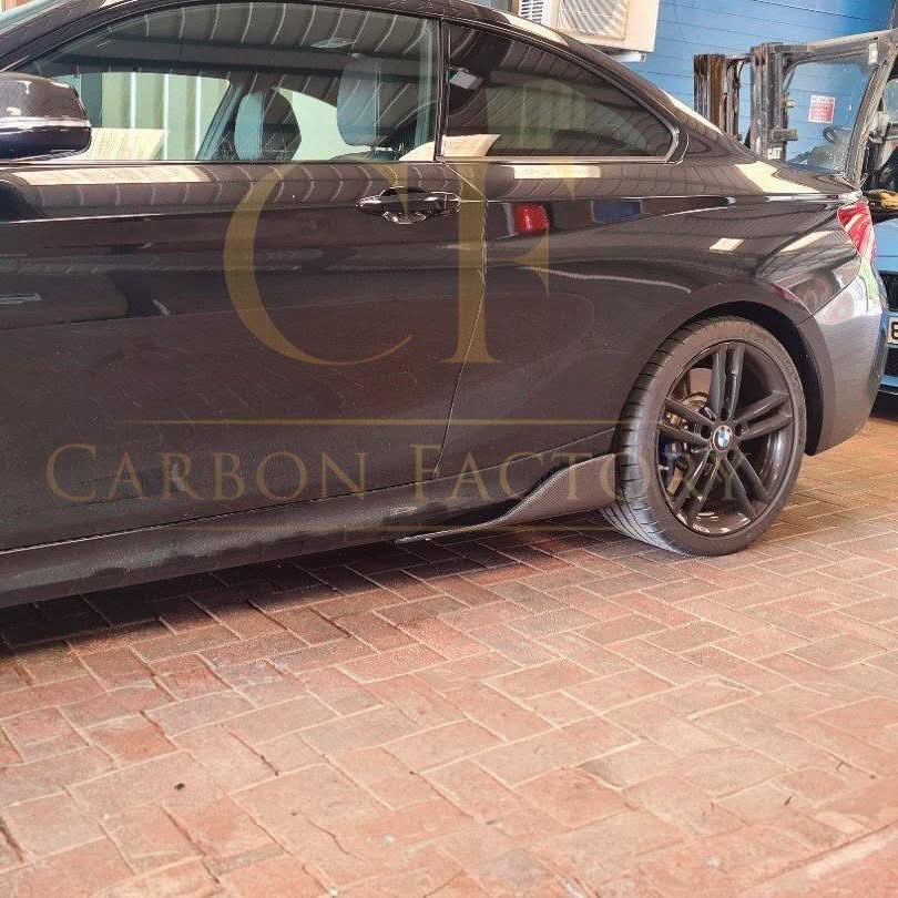 Carbon fibre side skirt for BMW F22 2 Series and F87 M2, MP Style, sleek aerodynamic design, fits 2016-2021 models.