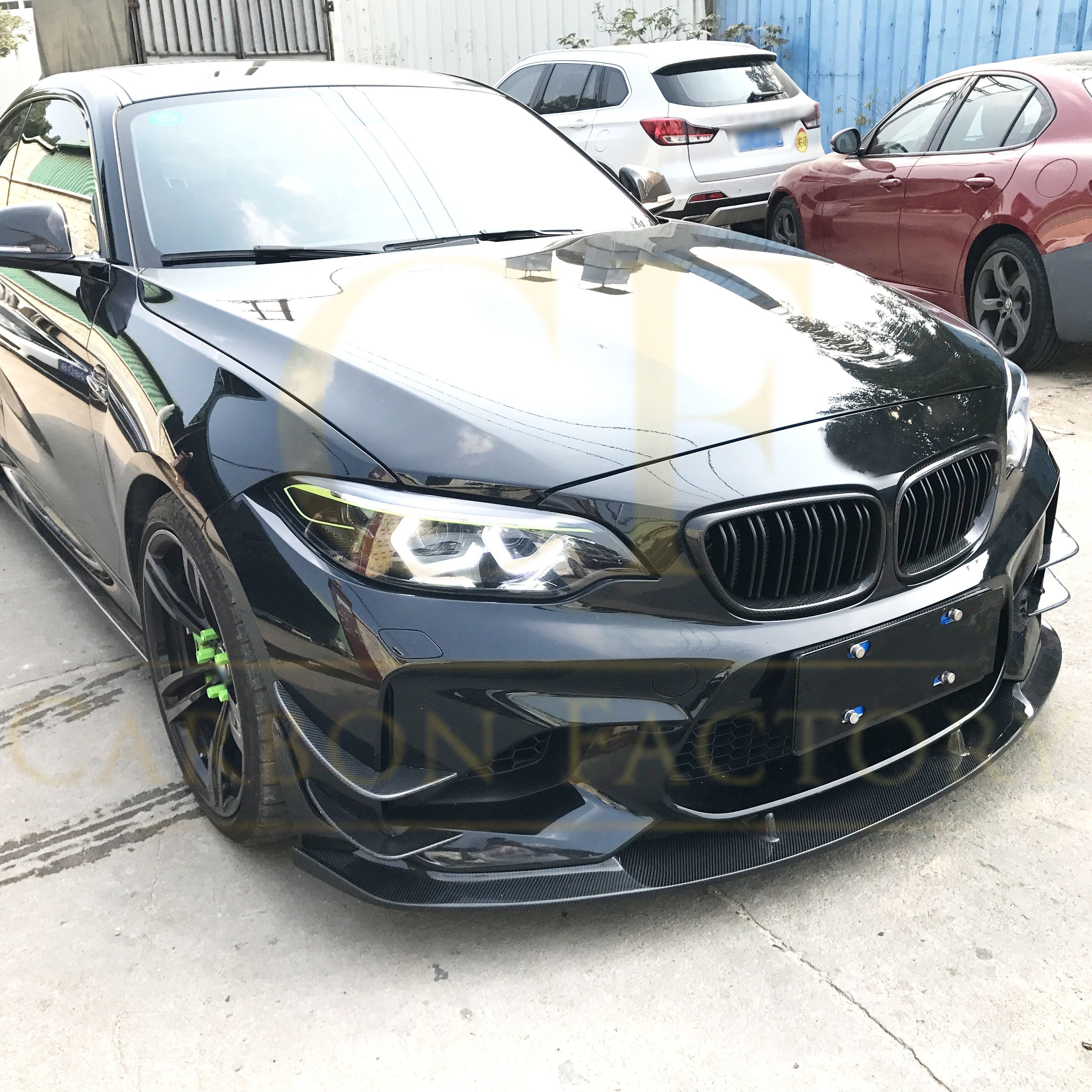 3D style carbon fiber front splitter for BMW F87 M2 OG 2016-2018, enhancing aerodynamics and sporty appearance.