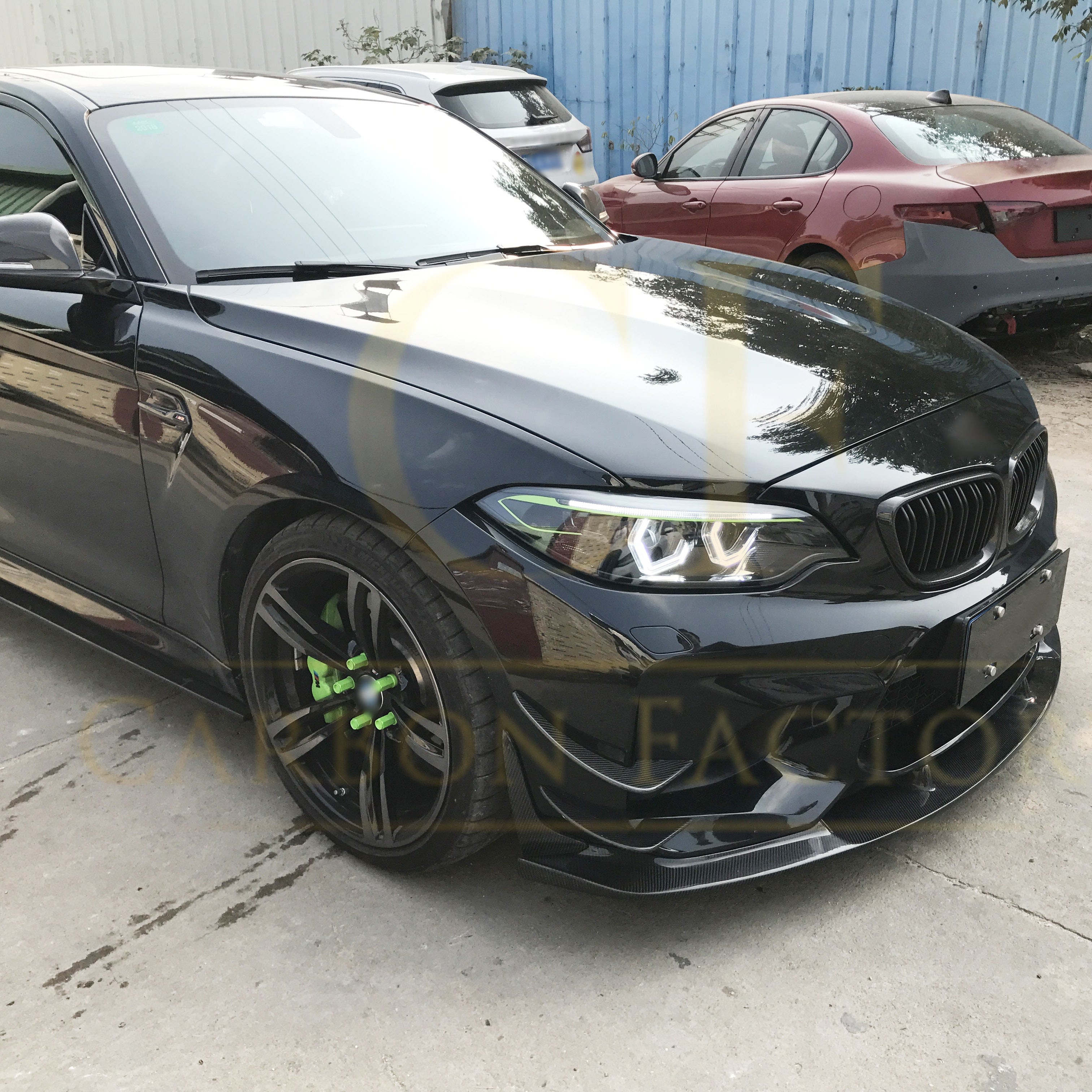 3D style carbon fibre front splitter for BMW F87 M2 OG 2016-2018, enhances aerodynamics and sporty look.