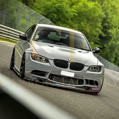 Carbon fibre GT4S V1 style front splitter installed on a BMW E90 E92 E93 M3, showcasing its sleek aerodynamic design.