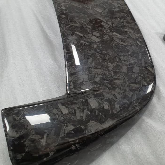 Carbon fibre front splitter for BMW F06, F12, F13 M6 (2011-2018), designed for sporty aerodynamic enhancement.