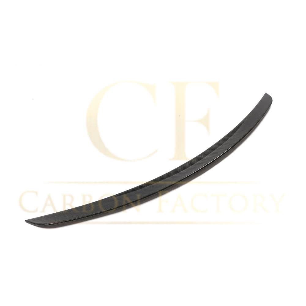 AMG-style carbon fiber boot spoiler for Mercedes-Benz C257 CLS 2019-present, enhancing sporty look and aerodynamic performance.