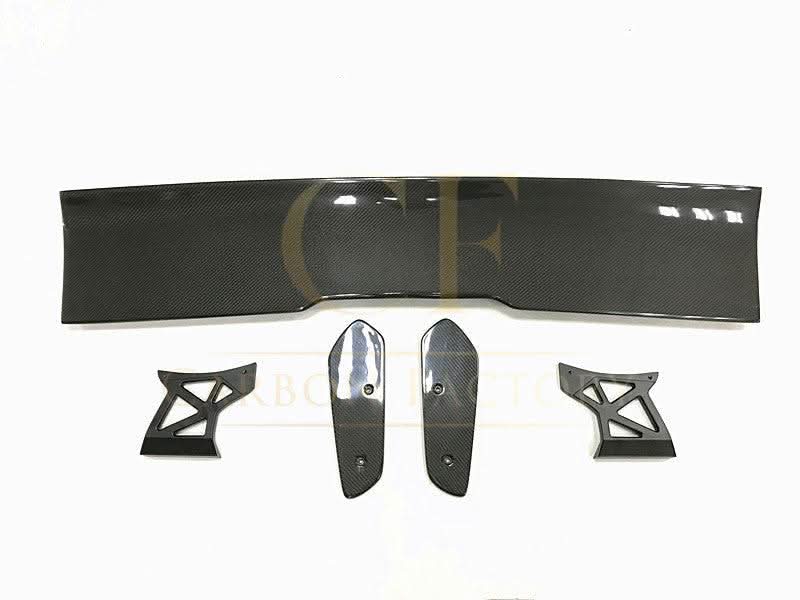 Carbon fibre GT spoiler for BMW F80 M3, F82 F83 M4 models 2014-2020, showcasing sleek aerodynamic design and high-performance style.