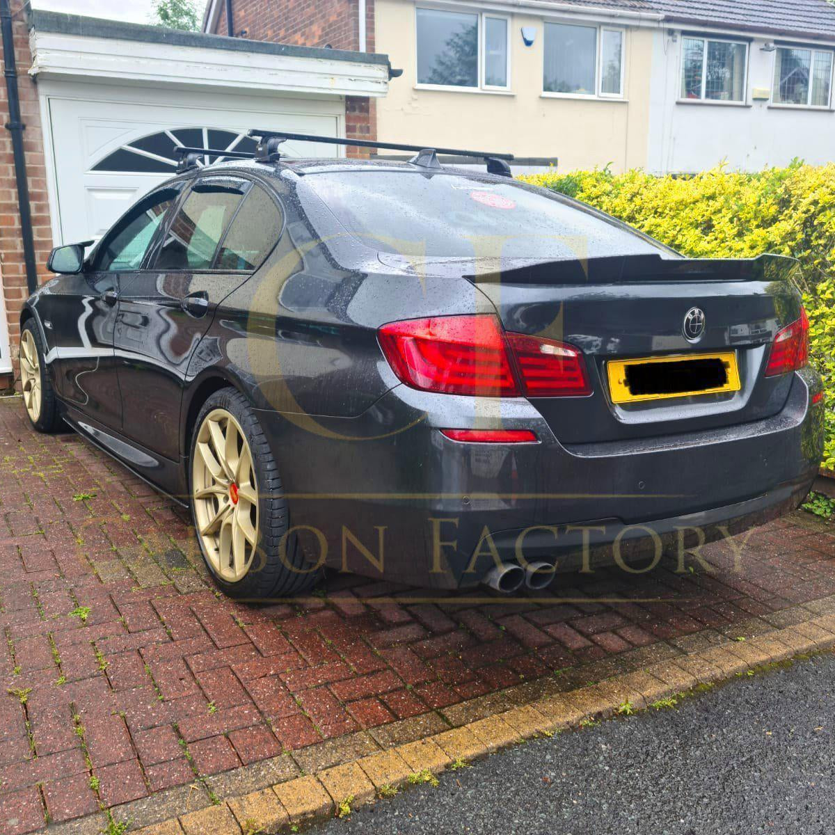 Carbon fibre BMW 5 Series F10 boot spoiler with PSM Style design, including M5 model, showcasing sleek aerodynamic enhancement.
