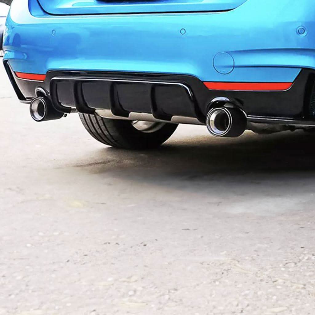 Gloss black rear diffuser with dual exhaust for BMW F32 F33 F36 4 Series, 2014-2020, showcasing sleek aerodynamic design.