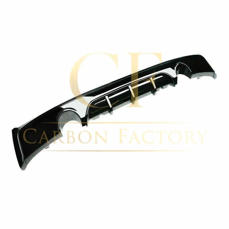 Gloss black rear diffuser with dual exhaust for BMW F22 2 Series M Sport, featuring sleek design and sporty styling.