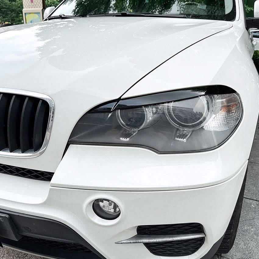 Gloss Black Headlight Trims for BMW E70 X5 08-14 - Carbon Factory