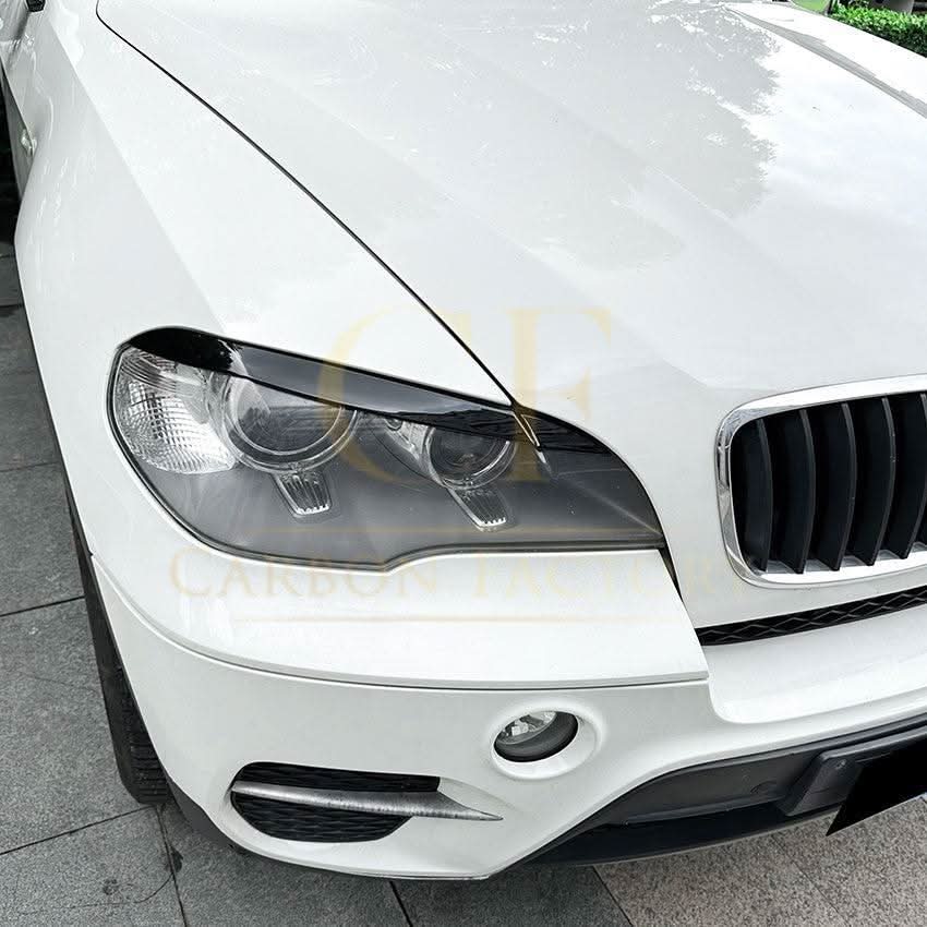 Gloss Black Headlight Trims for BMW E70 X5 08-14 - Carbon Factory
