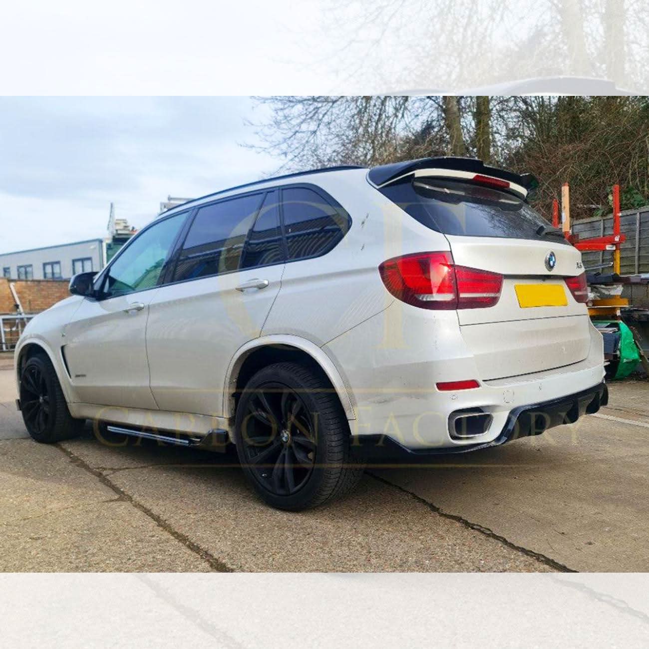 Gloss black BMW F15 X5 body kit with side skirts, splitter, diffuser, and rear spoiler, designed for 2013-2018 model.