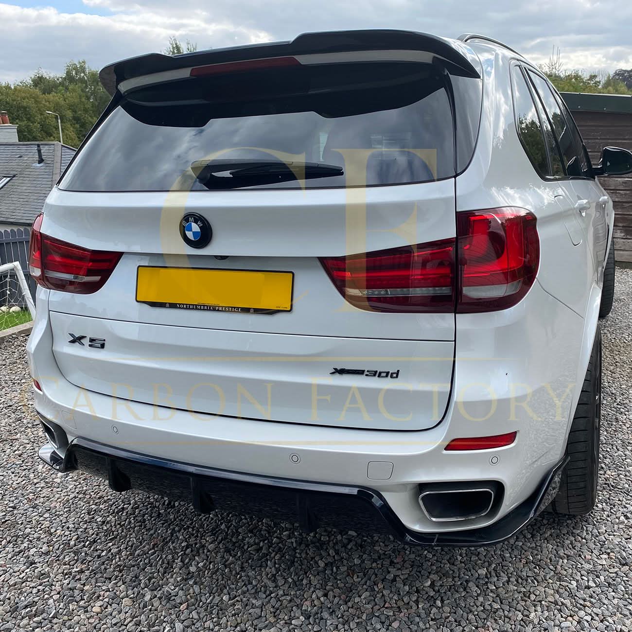 Gloss black carbon factory-style body kit with splitter, diffuser, side skirts, and spoiler for BMW F15 X5 (2013-2018).