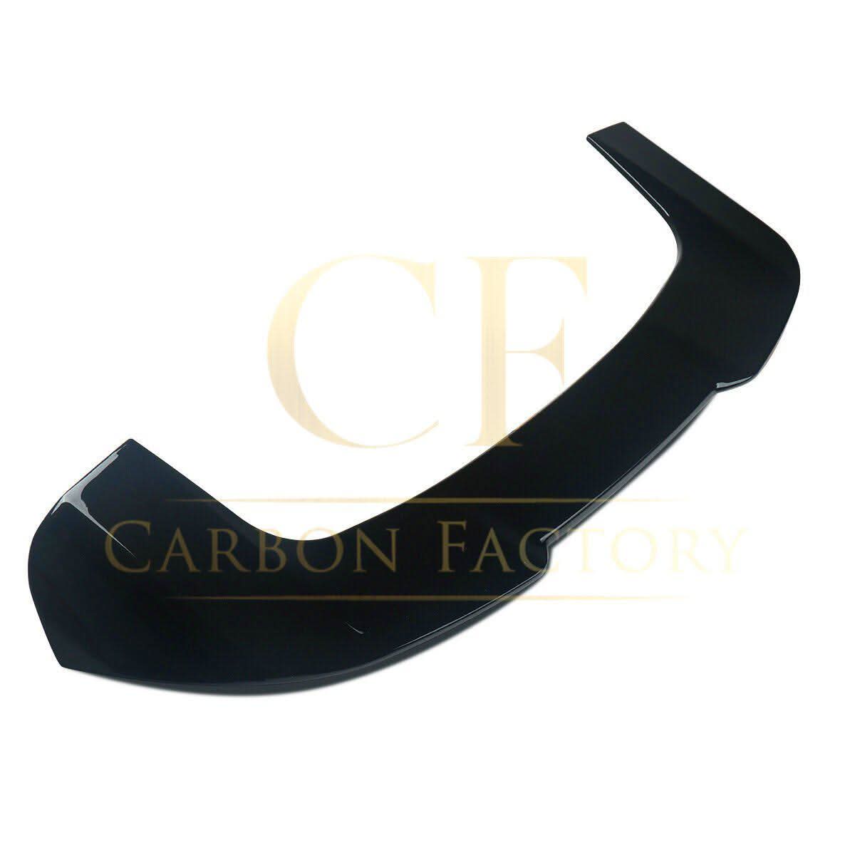 Gloss black BMW F15 X5 body kit with side skirts, splitter, diffuser, and spoiler, featuring carbon factory style design.