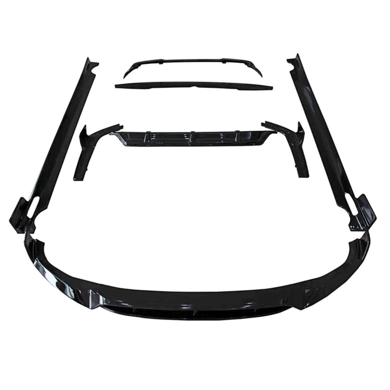Gloss black BMW G07 X7 LCI body kit with splitter, diffuser, side skirts, and spoiler, mounted on the vehicle.