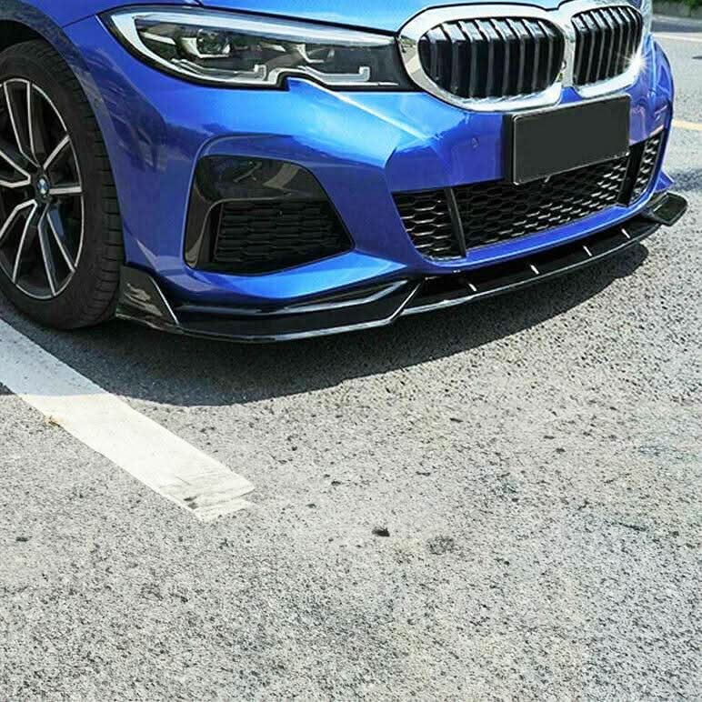 Gloss black competition-style front splitter for BMW 3 Series G20 G21 Pre-LCI, enhances aerodynamics and sporty appearance.