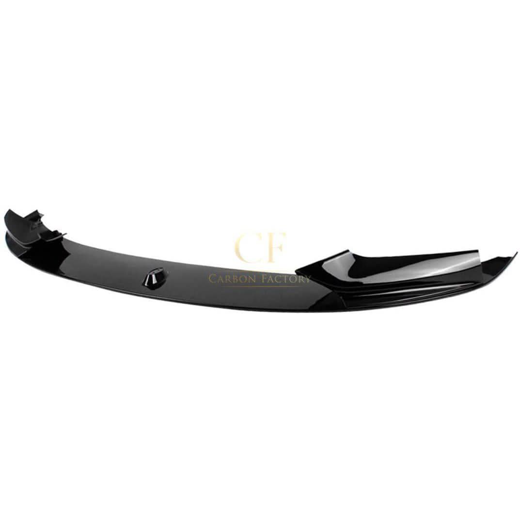 Gloss black front splitter for BMW F10 F11 5 Series, MP Style, mounted on the car's front bumper for enhanced sporty look