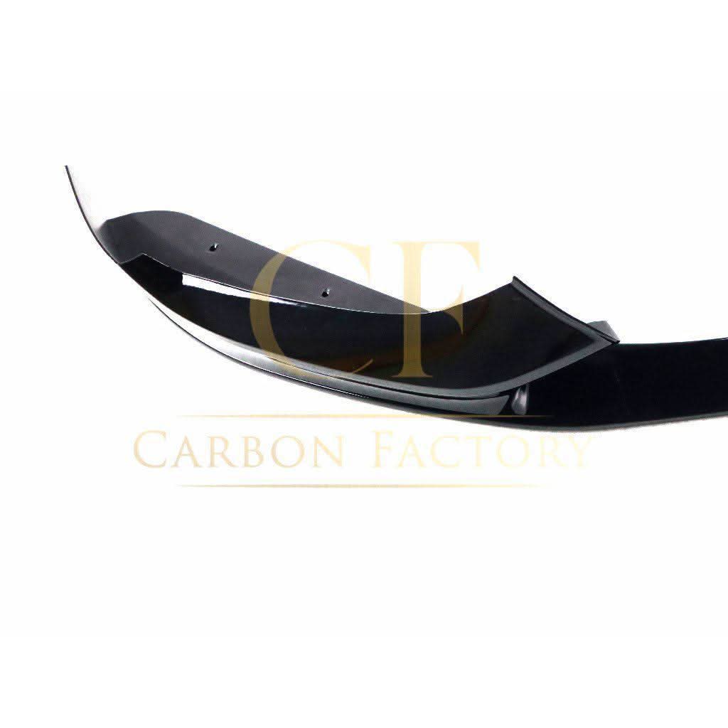 Gloss black front splitter for BMW F20 F21 1 Series LCI, enhancing sporty look with aerodynamic design.