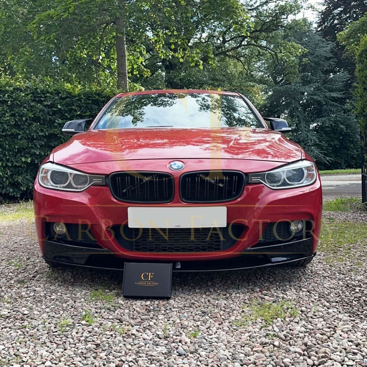 Gloss black MP Style front splitter for BMW F30 F31 3 Series M Sport, featuring aerodynamic design and detailed mounting points.