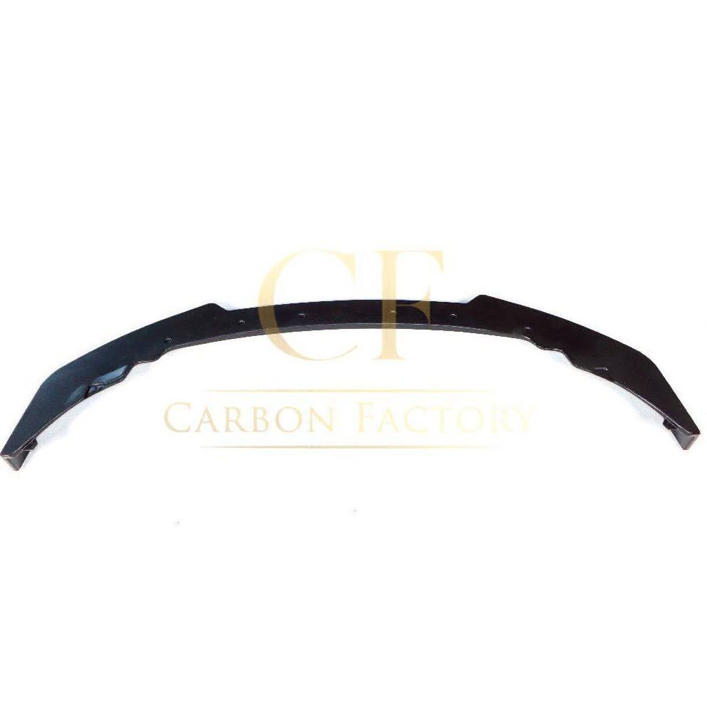 Gloss black front splitter for BMW F44 2 Series 4-door, designed to enhance aerodynamics and sporty look.