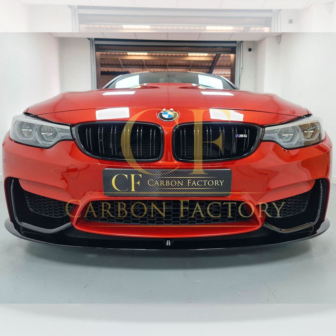 Gloss black MP Style front splitte for BMW F80 M3 F82 F83 M4, featuring aerodynamic design and precise fitment.