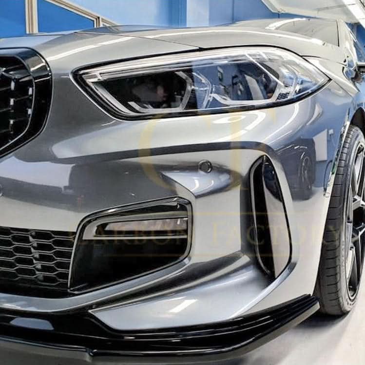 Gloss Black RS Style front splitte for BMW F40 1 Series 2019-2024, enhancing aerodynamics and sporty look.