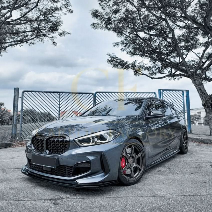 Gloss Black RS Style front splitter for BMW F40 1 Series 19-24, enhancing aerodynamics and sporty appearance.