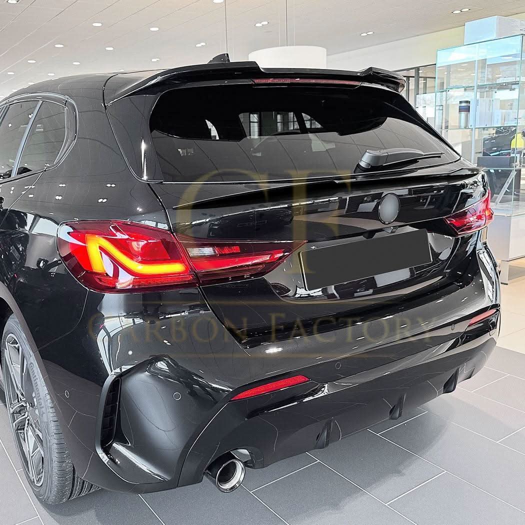 Gloss black mid spoiler for BMW F40 1 Series (2019-2024), showing the sleek, aerodynamic design and fitment details.
