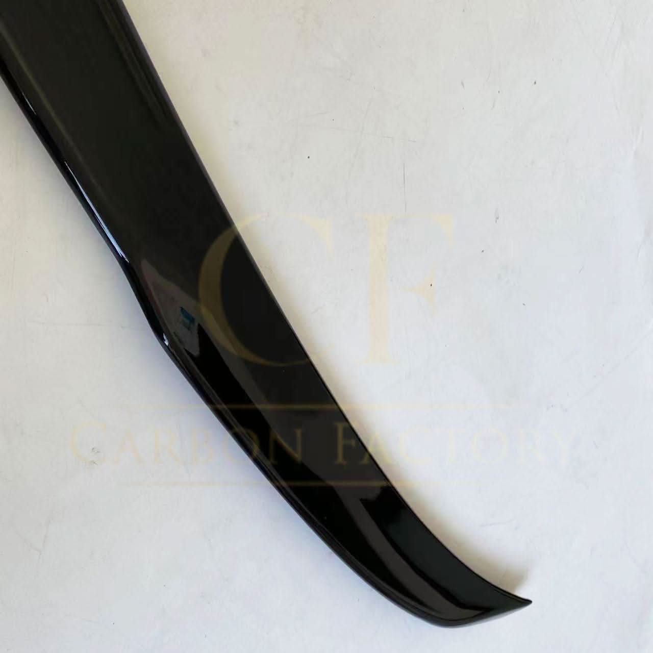 Gloss black M3-style boot spoiler for BMW G20 3 Series G80 M3, showcasing a sleek, aerodynamic design on a black car trunk.