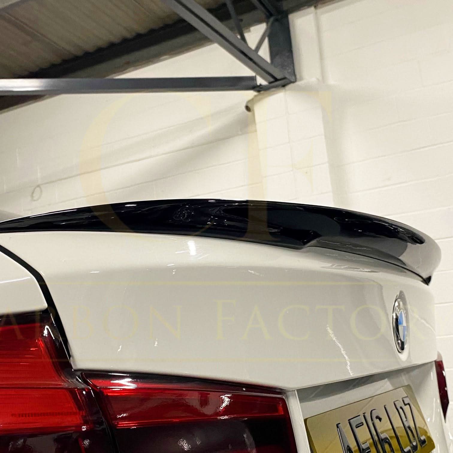 Gloss black MP Style boot spoiler for BMW 3 Series F30 F80 saloon, including M3 models, enhances sporty appearance.