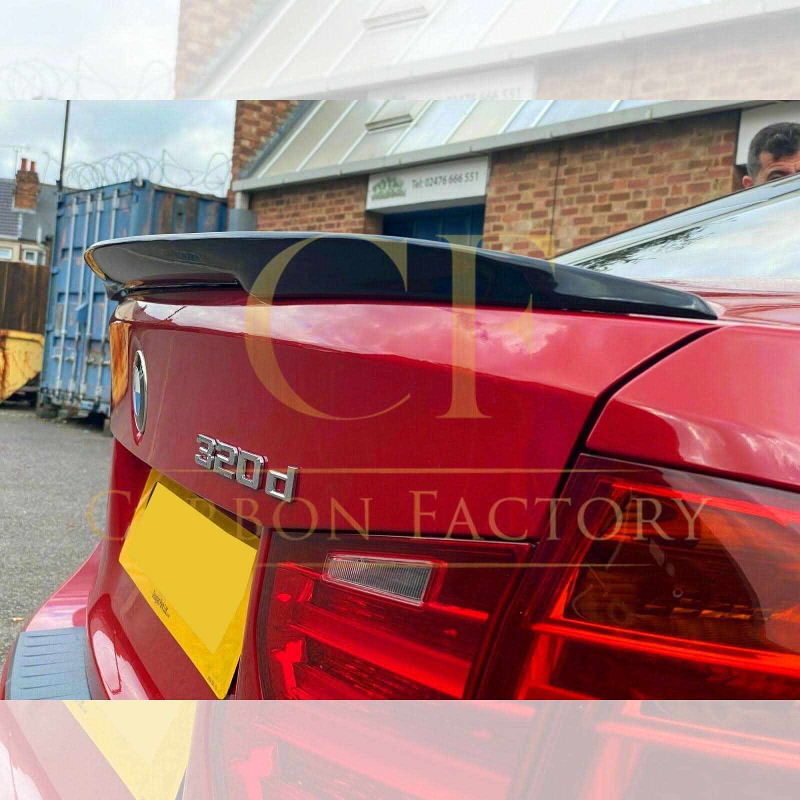 Gloss black MP Style boot spoiler for BMW 3 Series F30 F80 M3 saloon, enhancing sporty appearance and aerodynamics.