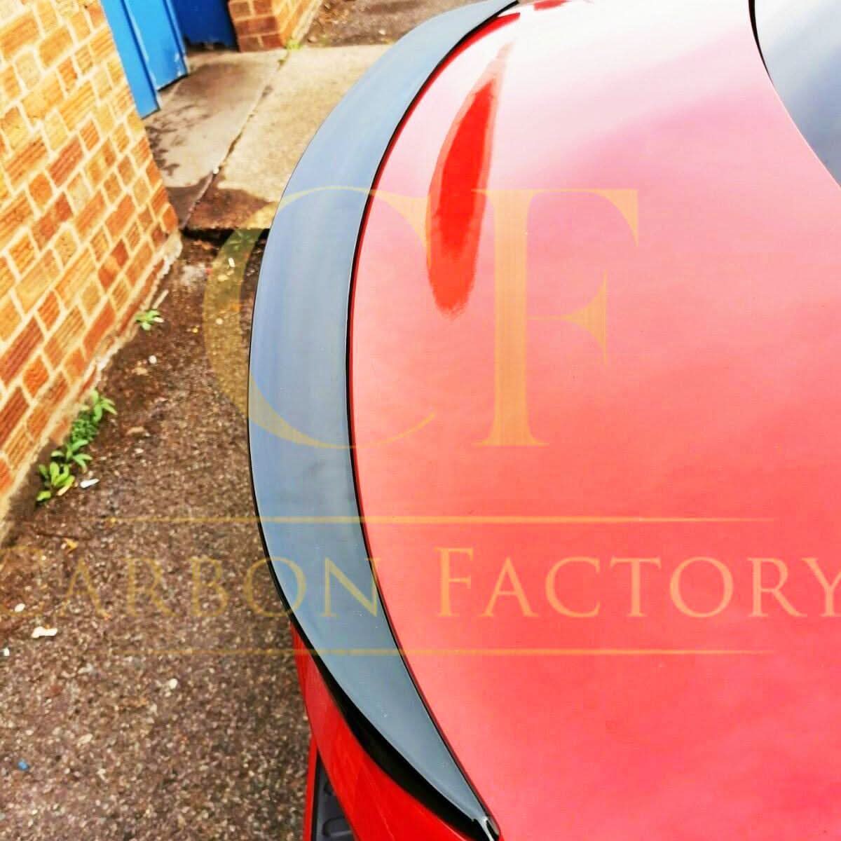 Gloss black MP Style boot spoiler for BMW 3 Series F30 F80 saloon, including M3 models, mounted on the vehicle's rear.