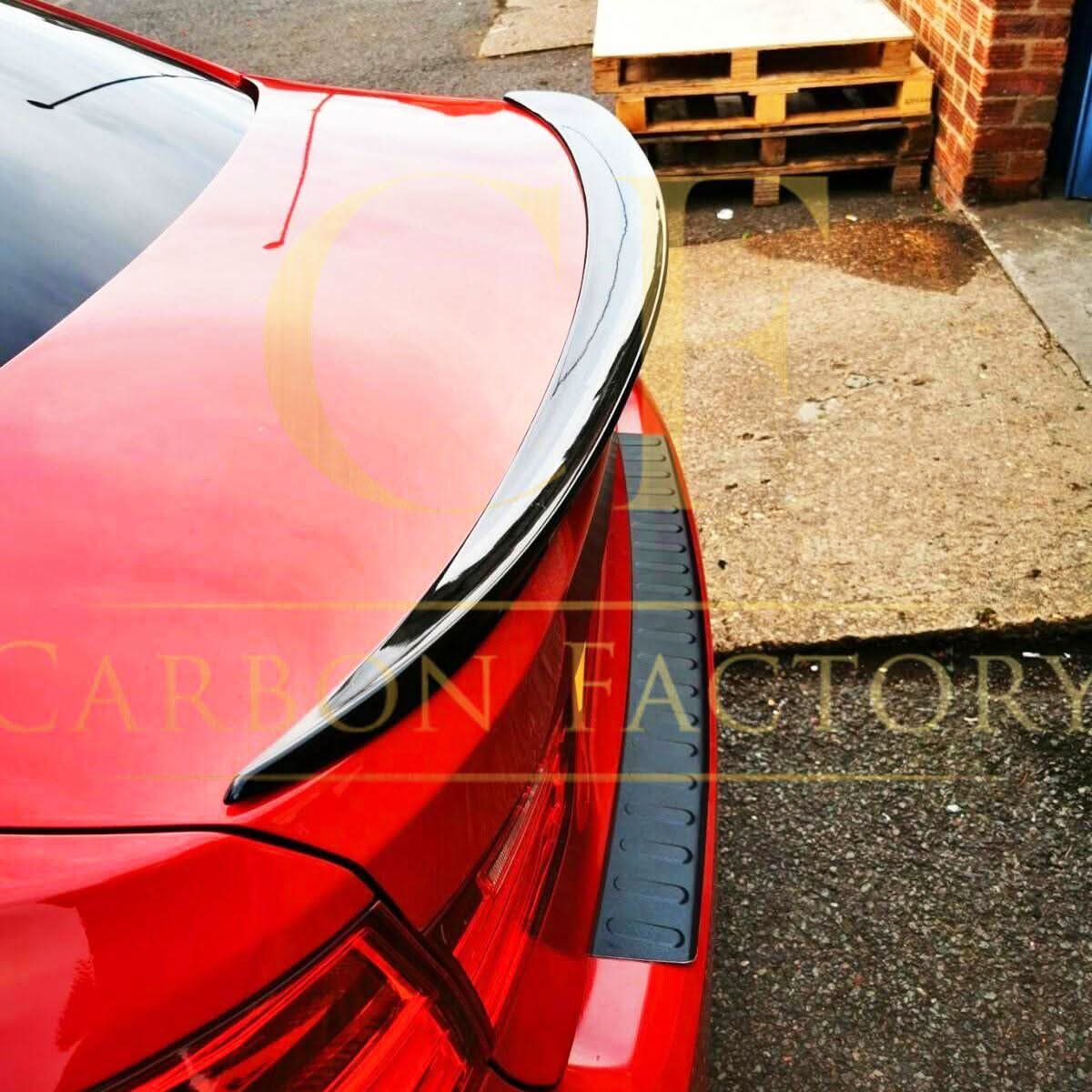 Gloss black MP Style boot spoiler for BMW 3 Series F30 F80 M3 sedan, enhancing sporty look and aerodynamics.